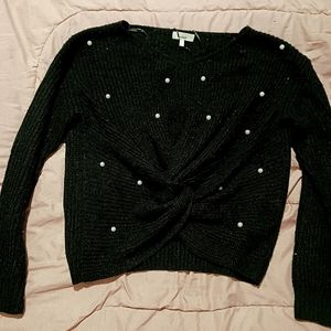 Black sweater with pearls